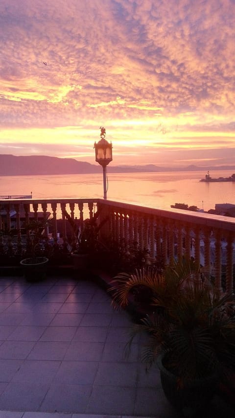 Nearby landmark, Natural landscape, View (from property/room), Balcony/Terrace, Lake view, Sunset