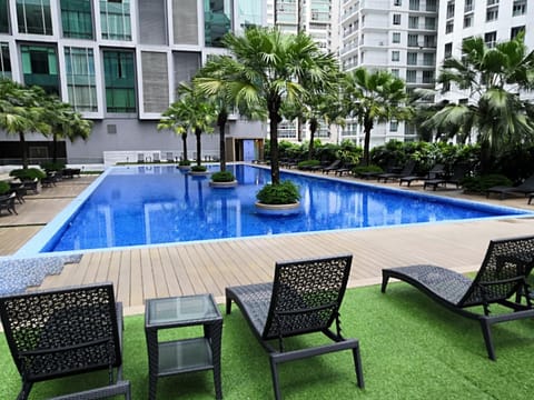 Property building, Pool view, Swimming pool, sunbed