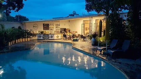 Property building, Night, Natural landscape, Pool view, Swimming pool, sunbed
