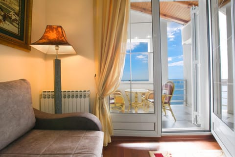 Natural landscape, Living room, Seating area, Sea view