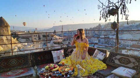 Property building, People, Natural landscape, View (from property/room), Seating area, City view, Garden view, Landmark view, Mountain view, Street view
