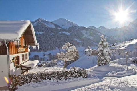 Property building, Day, Natural landscape, Winter, Mountain view