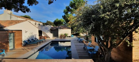 Property building, Pool view, Swimming pool, sunbed