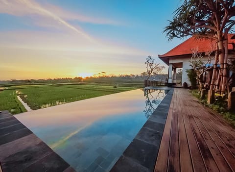 Natural landscape, View (from property/room), Swimming pool, Sunset
