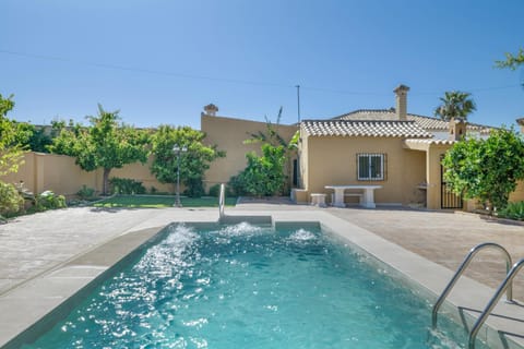 Property building, Living room, Swimming pool
