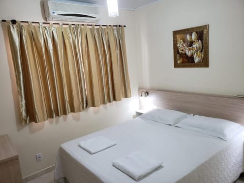 Bed, Bedroom, towels, air conditioner