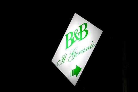 Night, Property logo or sign, Text overlay, Street view
