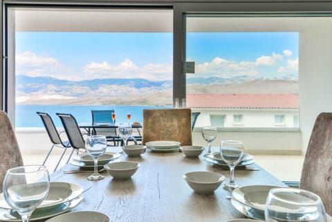 Natural landscape, Living room, Seating area, Dining area, Mountain view, Sea view