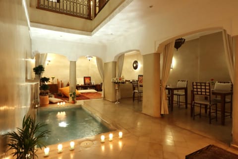 Patio, Living room, Seating area, Dining area, Pool view, Swimming pool, Breakfast