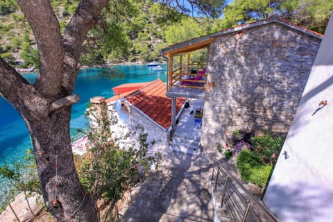 Property building, Facade/entrance, Natural landscape, Beach, Sea view