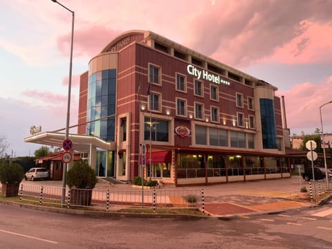 Property building, Day, Property logo or sign, Sunset