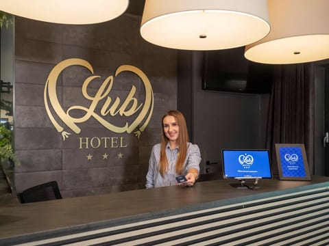 Property building, Staff, People, Property logo or sign, Lobby or reception, Logo/Certificate/Sign, Guests, Certificate/Award