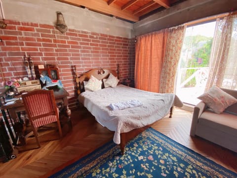 Bed, Seating area, Bedroom