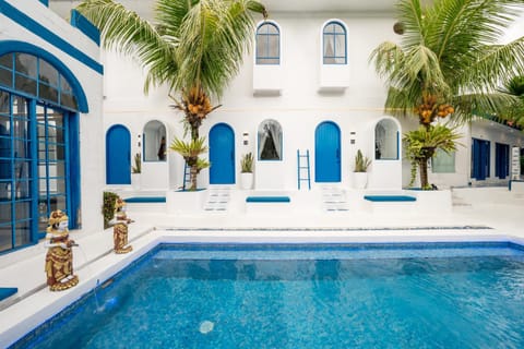 Property building, Patio, Day, Pool view, Swimming pool