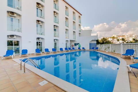 Property building, Pool view, Swimming pool, sunbed