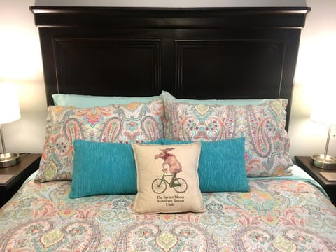 Bed, Property logo or sign, Decorative detail, Bedroom