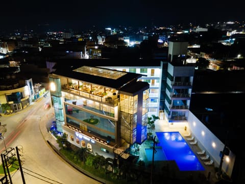 Property building, Patio, Night, City view, Pool view, Street view, Swimming pool