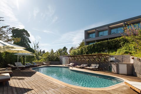 Property building, Swimming pool, sunbed