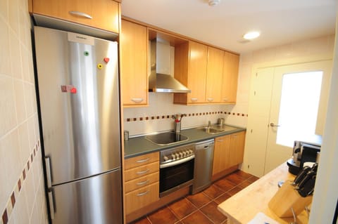 Kitchen or kitchenette, oven, stove