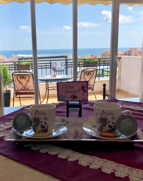 Patio, Coffee/tea facilities, View (from property/room), Balcony/Terrace, Living room, Food and drinks, Seating area, Dining area, Sea view