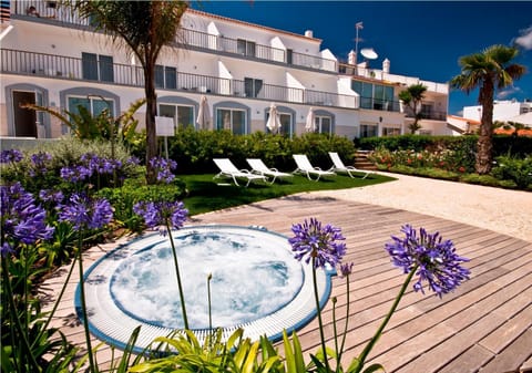 Facade/entrance, Natural landscape, Garden, Spa and wellness centre/facilities, Garden view, Landmark view, Landmark view, Sea view, Sea view, sunbed