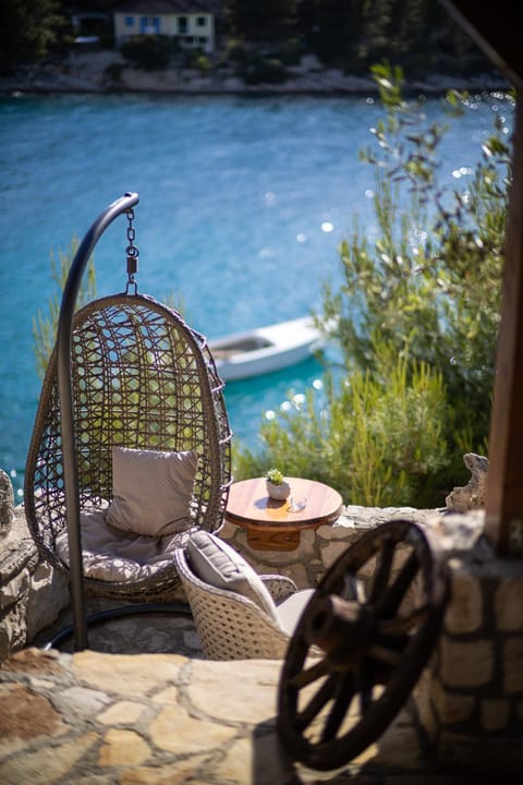 Patio, Day, Natural landscape, Living room, Seating area, Sea view