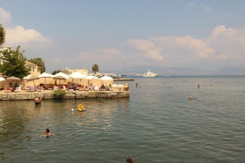 Property building, Nearby landmark, Restaurant/places to eat, Off site, Day, Natural landscape, Summer, Beach