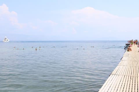 Property building, Nearby landmark, Restaurant/places to eat, Off site, Day, Natural landscape, Summer, Beach