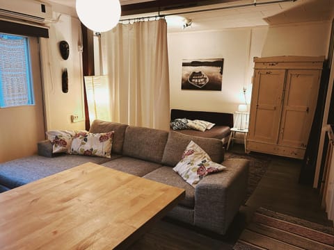 Bed, Living room, Seating area, Bedroom