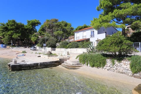 Property building, Day, Natural landscape, Beach, Sea view