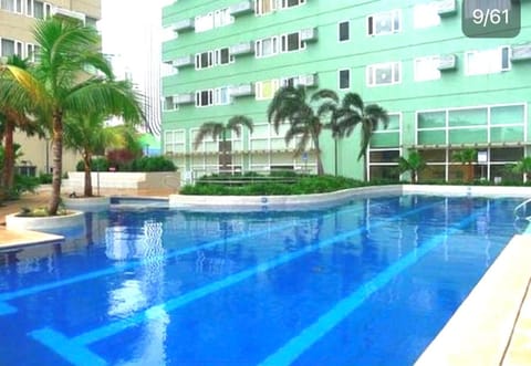 Property building, Day, Pool view, Swimming pool, sunbed