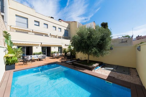 Property building, Patio, BBQ facilities, Garden, Swimming pool, Swimming pool