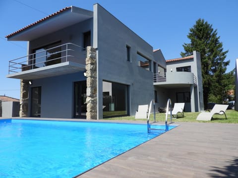 Property building, Pool view, Swimming pool, sunbed