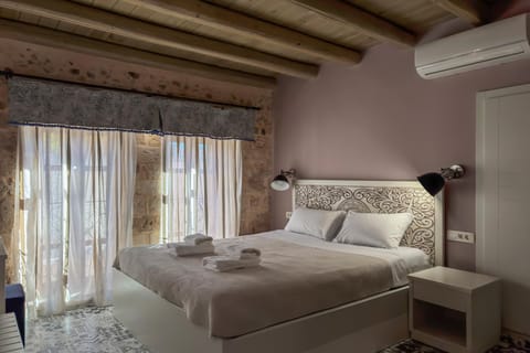 Bed, Photo of the whole room, Bedroom, towels, air conditioner