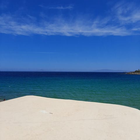 Property building, Nearby landmark, Day, Natural landscape, Beach, Sea view