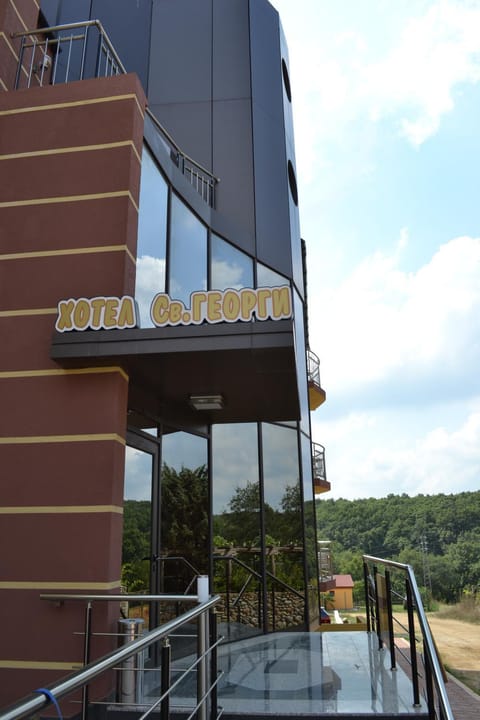 Facade/entrance, Day, Property logo or sign