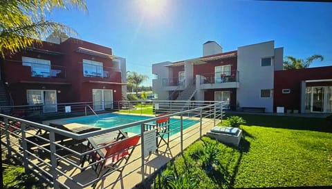 Property building, Pool view, Swimming pool, sunbed