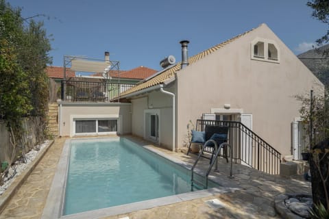 Property building, Living room, Swimming pool