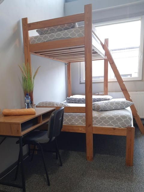 Photo of the whole room, bunk bed, hair dresser