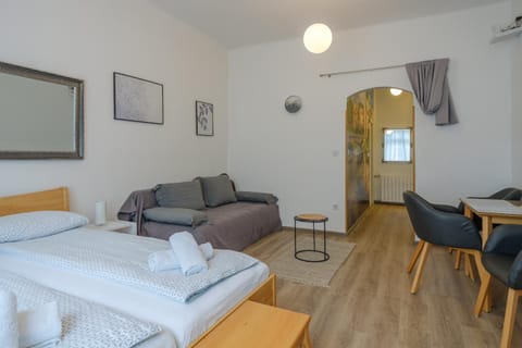 Bed, Living room, Seating area, Dining area, Bedroom