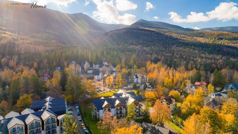 Property building, Nearby landmark, Day, Natural landscape, Bird's eye view, Mountain view