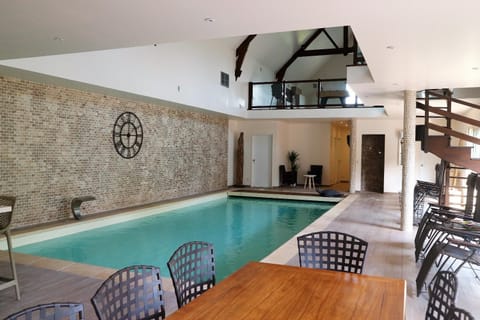 Property building, TV and multimedia, View (from property/room), View (from property/room), Living room, Seating area, Pool view, Swimming pool, Entertainment, sunbed