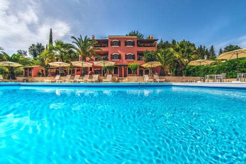 Property building, Day, Natural landscape, Pool view, Swimming pool, sunbed