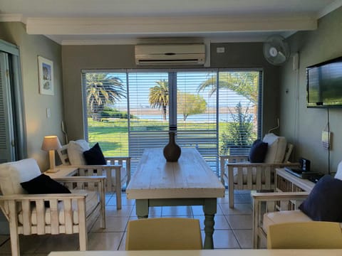 Living room, Seating area, Dining area, River view