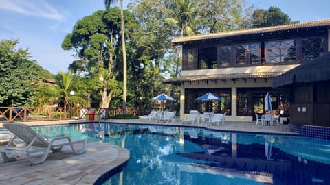 Property building, Patio, Day, Garden, Garden view, Pool view, Swimming pool, sunbed