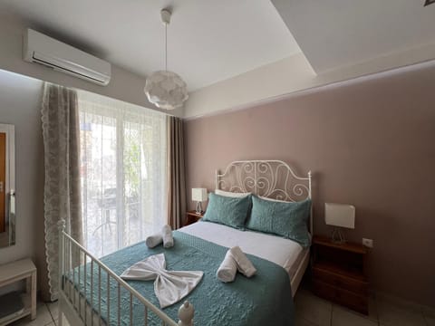 Bed, Photo of the whole room, Bedroom, towels, air conditioner