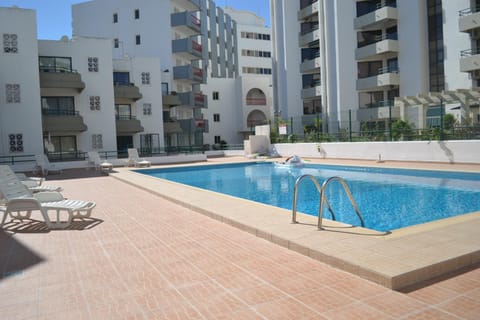 Property building, Swimming pool, sunbed