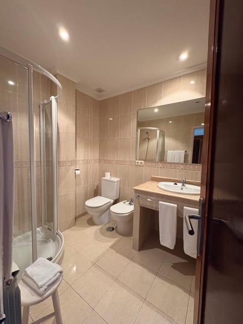 Bathroom, bidet, towels