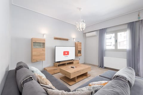 TV and multimedia, Living room, Seating area, air conditioner