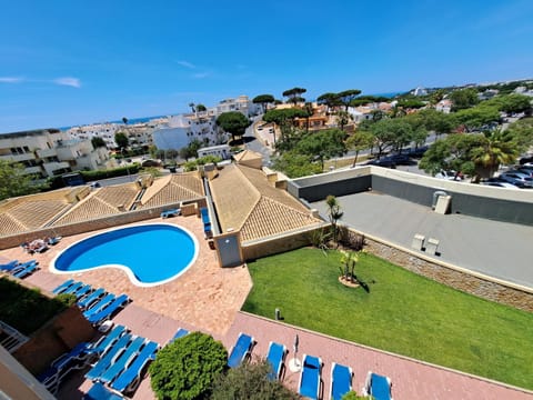 Property building, Living room, Swimming pool